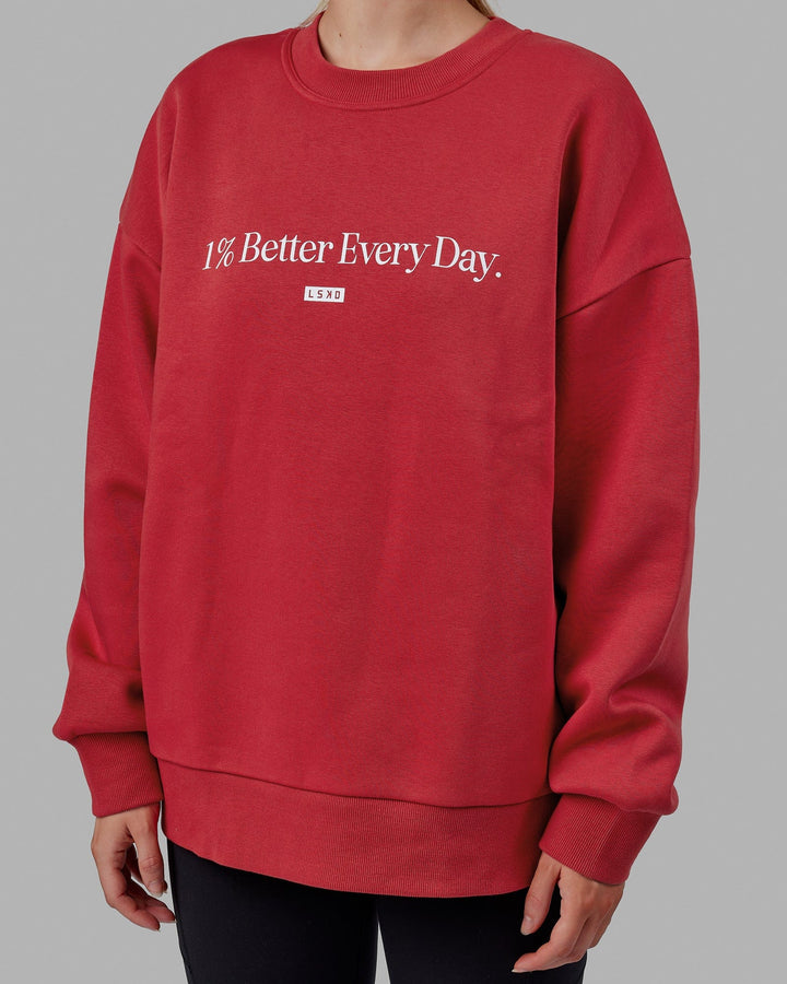 Woman wearing Unisex 1% Better Sweater Oversize - Cardinal