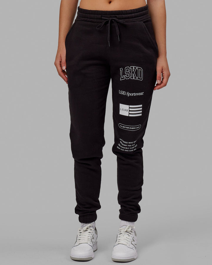 Woman wearing Unisex Academy Track Pant - Black