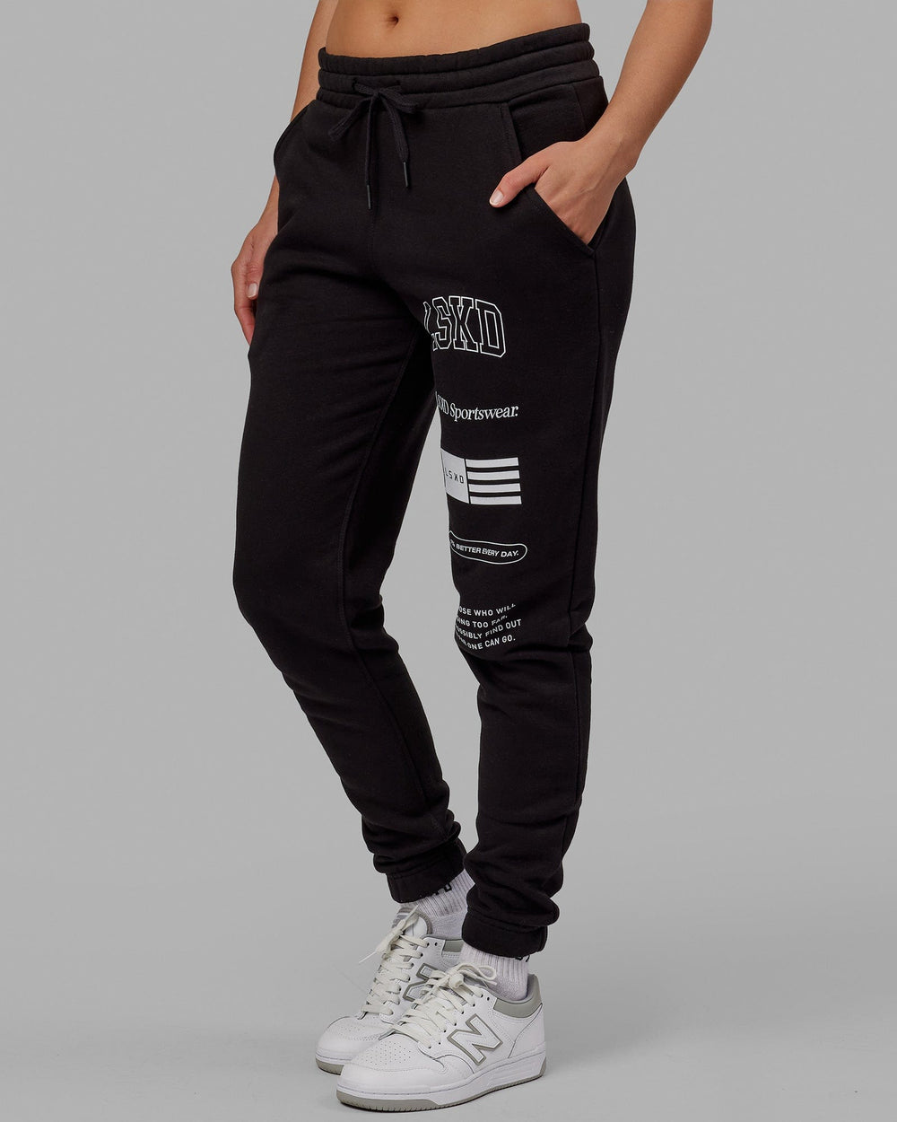 Woman wearing Unisex Academy Track Pant - Black