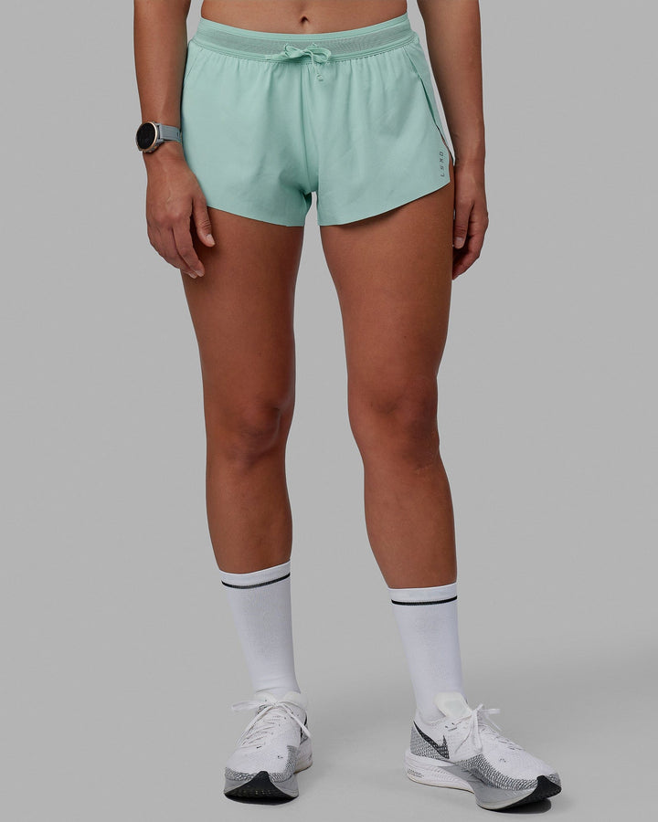 Woman wearing Accelerate Run Shorts - Pastel Turquoise