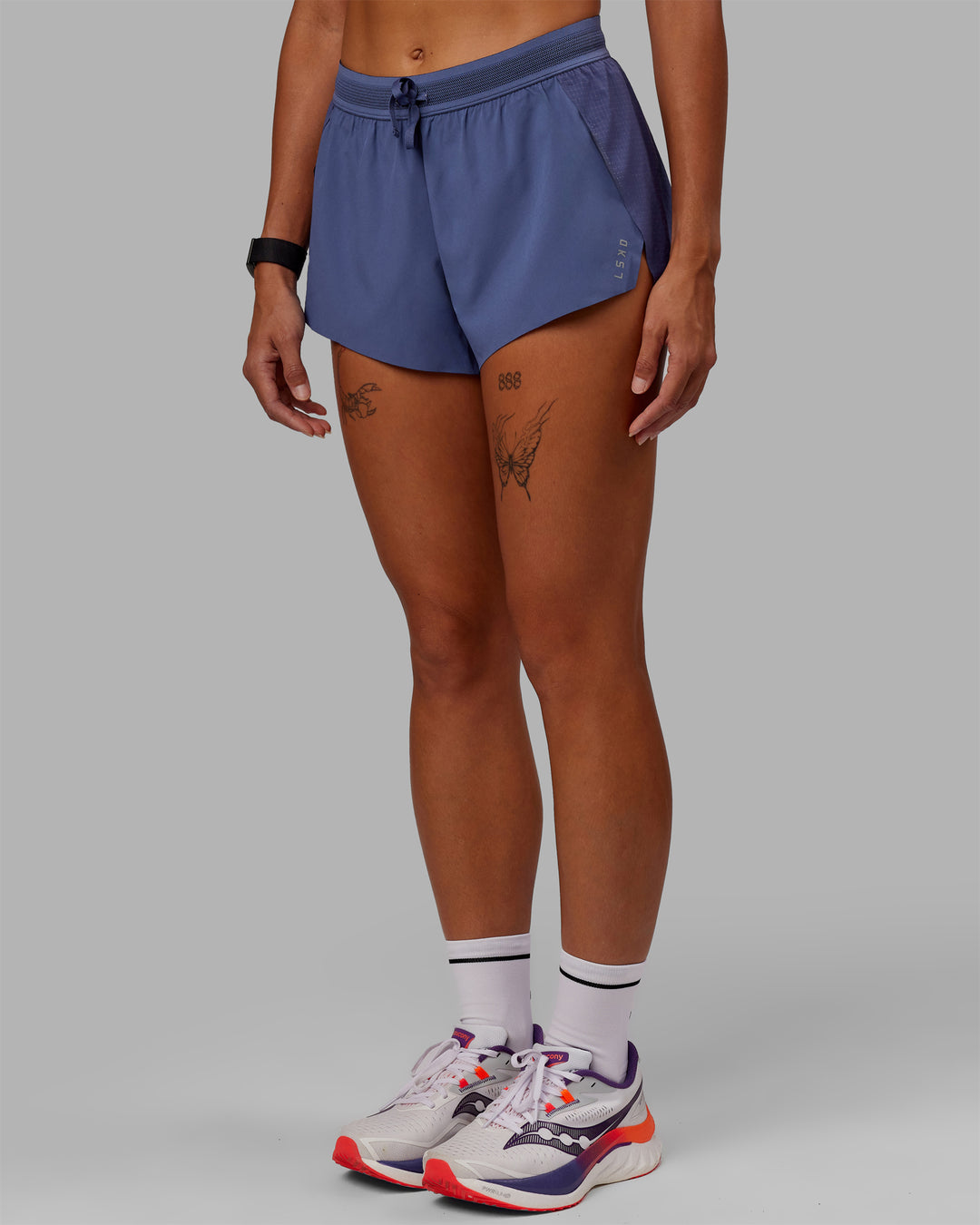 Woman wearing Accelerate Run Shorts - Future Dusk