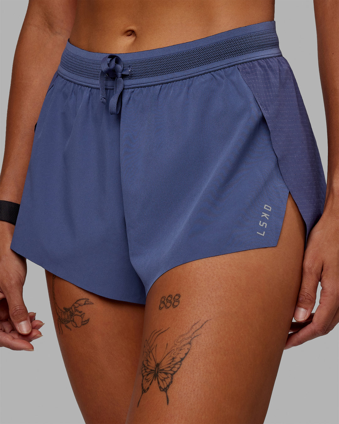 Woman wearing Accelerate Run Shorts - Future Dusk