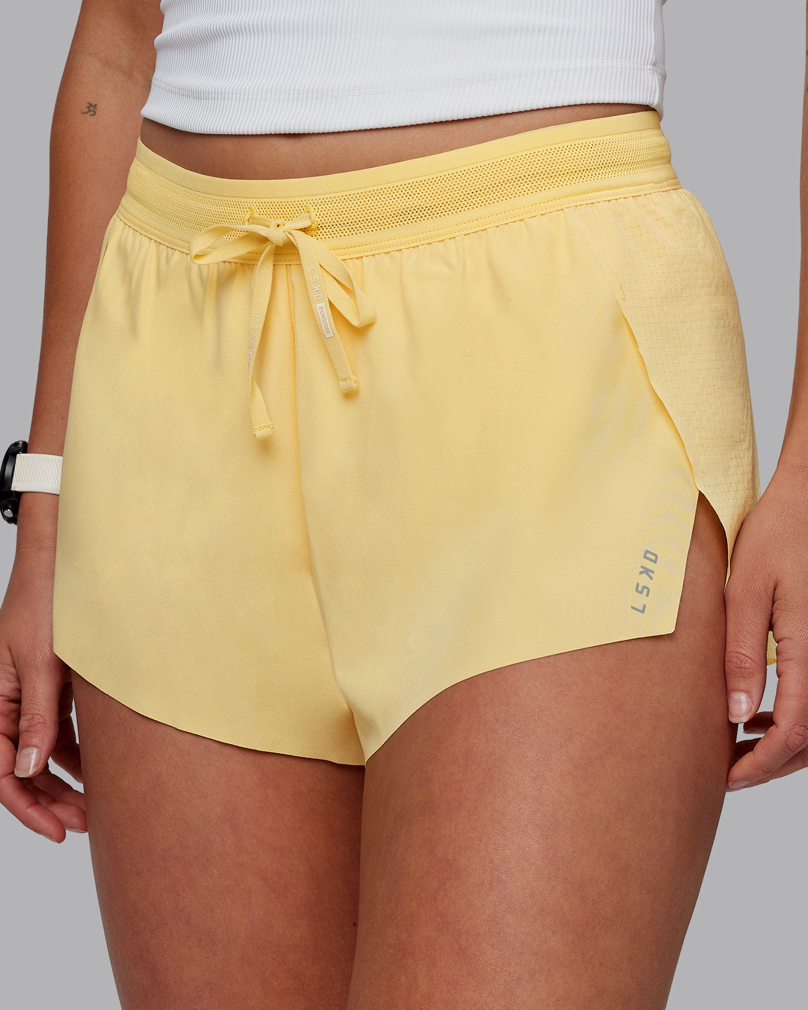 Woman wearing Accelerate 3" Run Shorts - Sunflower