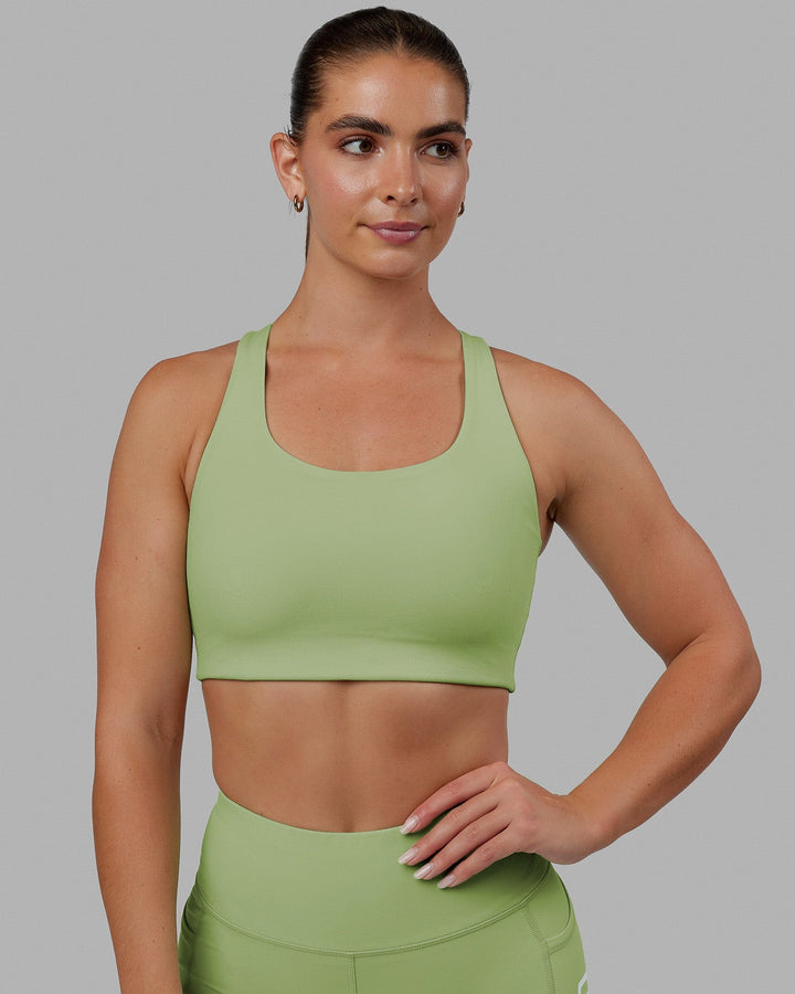 Woman wearing Ace Long Line Bra - Green Fig