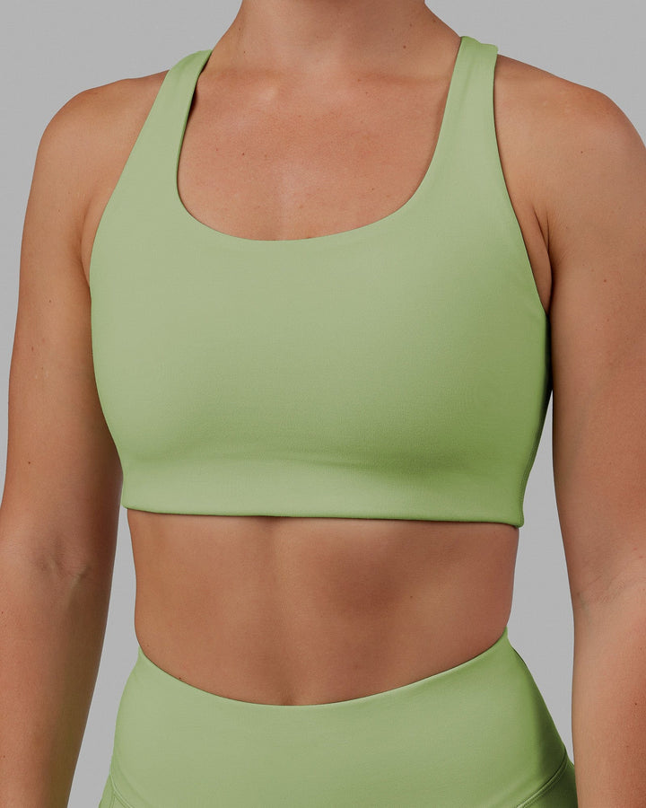 Woman wearing Ace Long Line Bra - Green Fig