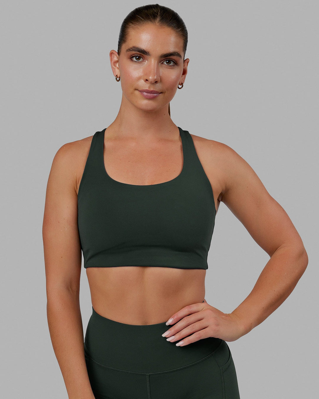 Woman wearing Ace Long Line Bra - Vital Green