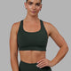 Woman wearing Ace Long Line Bra - Vital Green