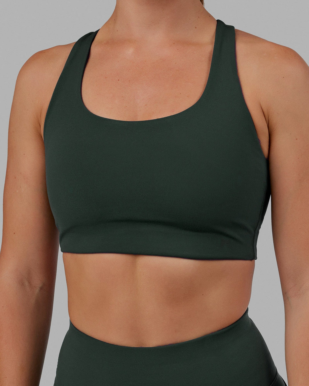 Woman wearing Ace Long Line Bra - Vital Green