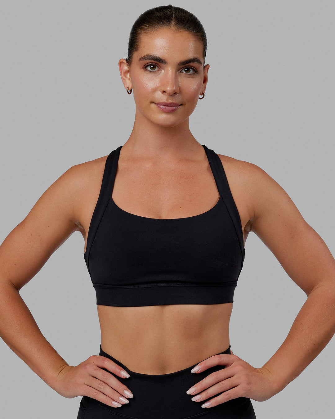 Woman wearing Advance Sports Bra - Black