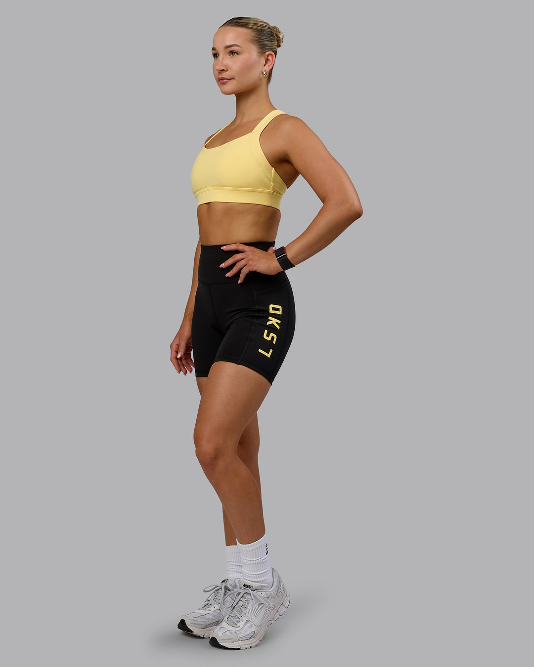 Woman wearing Advance Sports Bra - Lemon