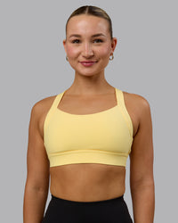 Woman wearing Advance Sports Bra - Lemon