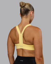 Woman wearing Advance Sports Bra - Lemon