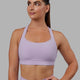 Woman wearing Advance Sports Bra - Pale Lilac