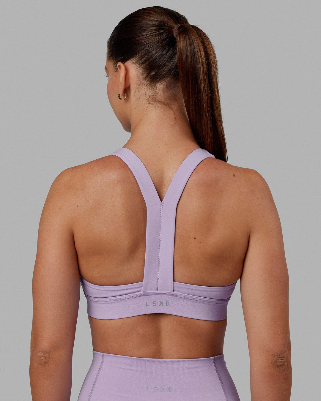 Woman wearing Advance Sports Bra - Pale Lilac