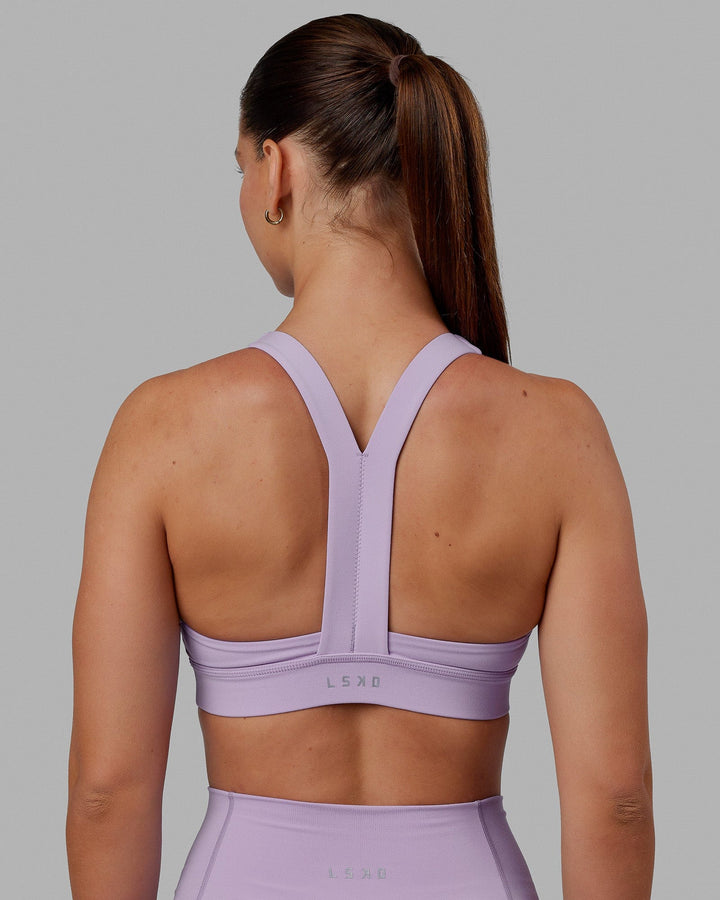 Woman wearing Advance Sports Bra - Pale Lilac