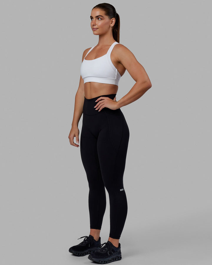 Woman wearing Advance Sports Bra - White