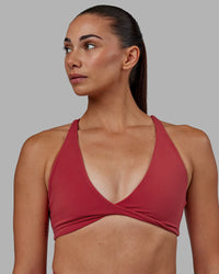 Woman wearing Agile Sports Bra - Claret