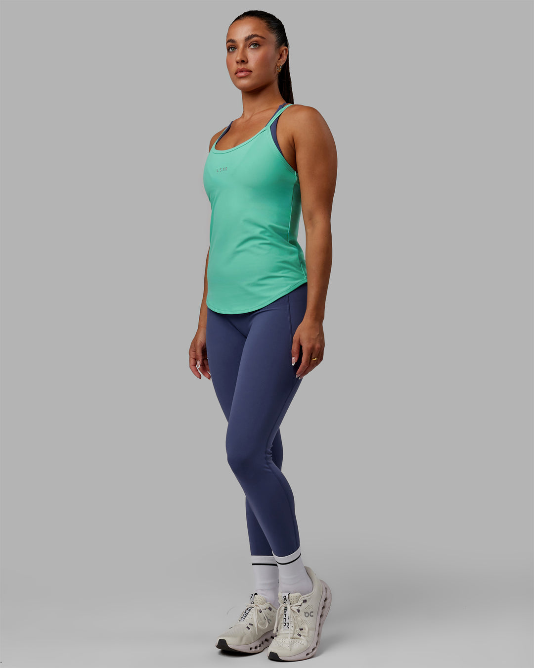 Woman wearing Agility Active Tank - Aquatic Awe