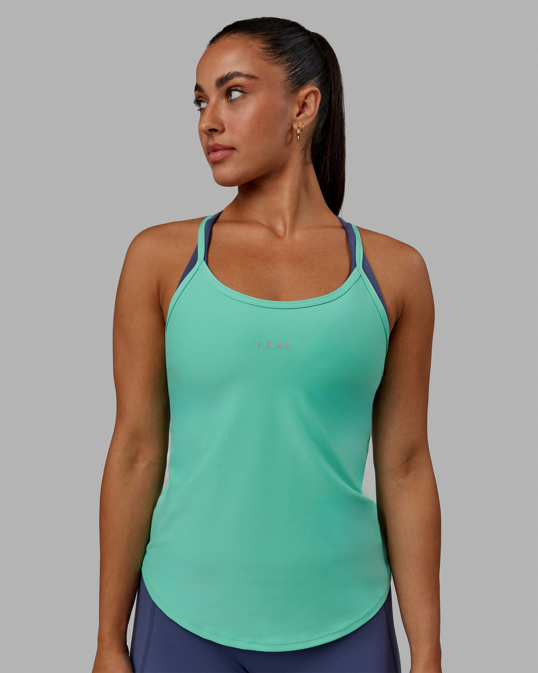 Woman wearing Agility Active Tank - Aquatic Awe