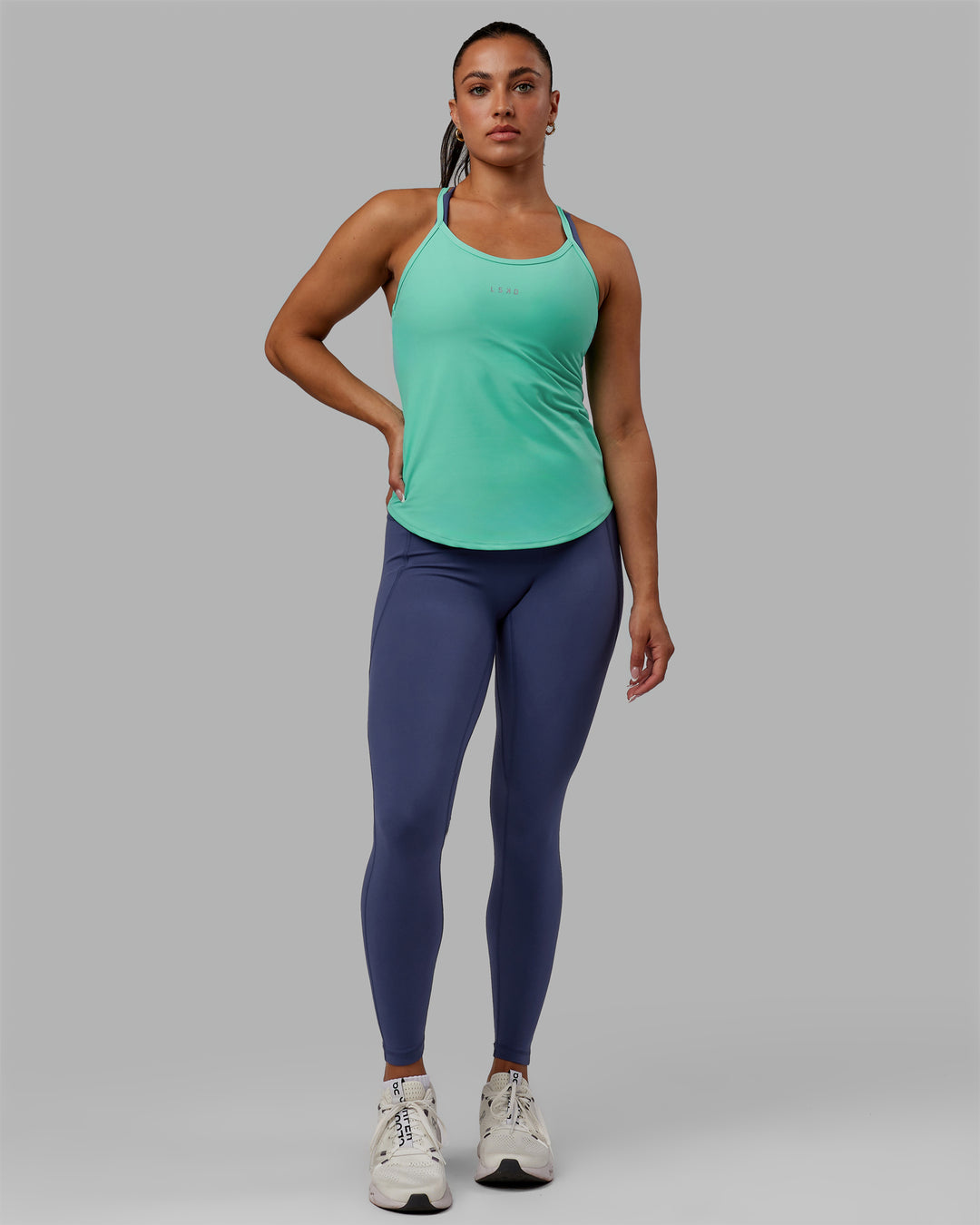 Woman wearing Agility Active Tank - Aquatic Awe