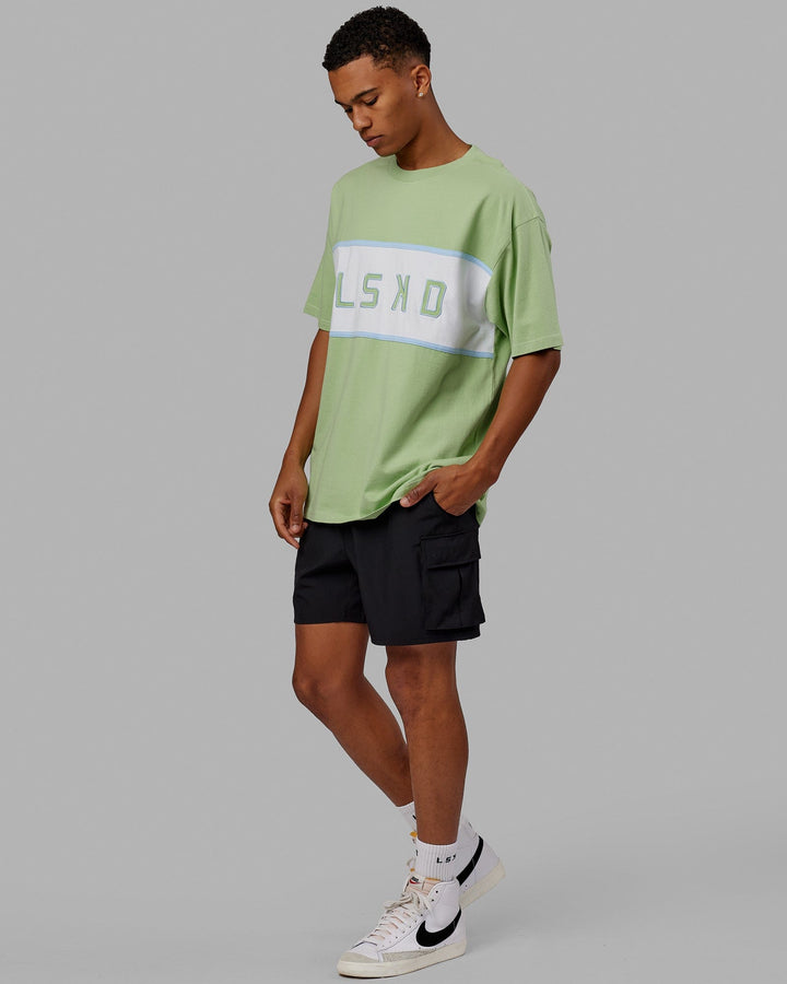 Man wearing Unisex Aligned Heavyweight Tee Oversize - Green Fig