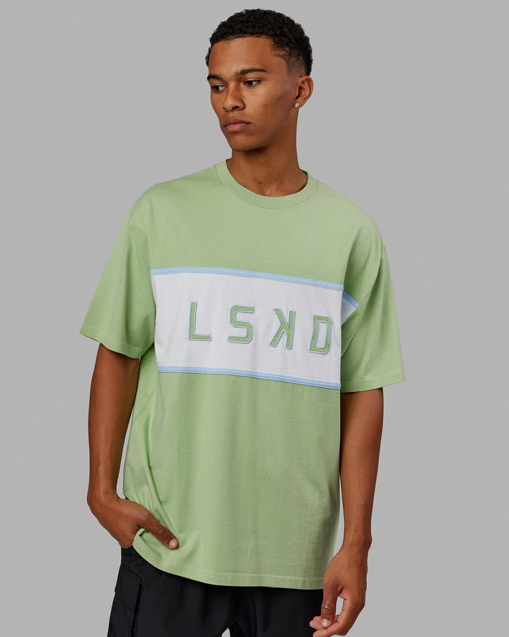 Man wearing Unisex Aligned Heavyweight Tee Oversize - Green Fig