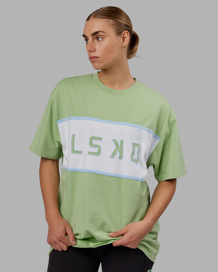 Woman wearing Unisex Aligned Heavyweight Tee Oversize - Green Fig