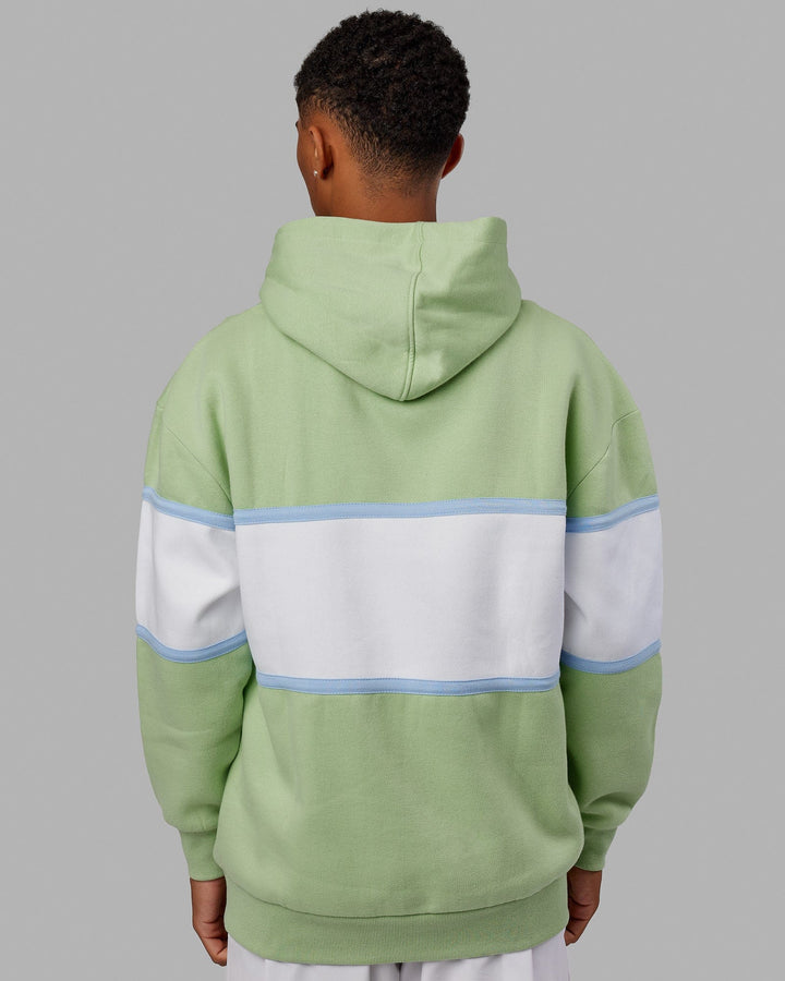 Man wearing Unisex Aligned Hoodie Oversize - Green Fig