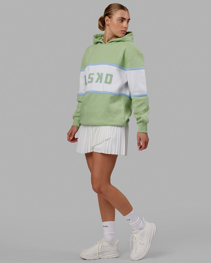 Woman wearing Unisex Aligned Hoodie Oversize - Green Fig