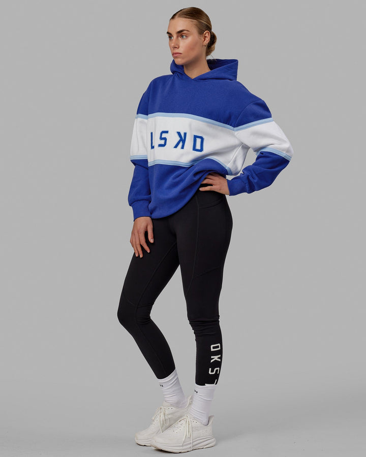 Woman wearing Unisex Aligned Hoodie Oversize - Power Cobalt
