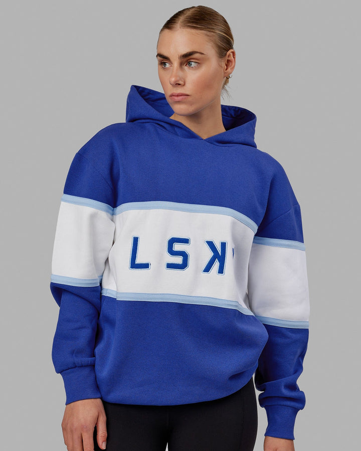 Woman wearing Unisex Aligned Hoodie Oversize - Power Cobalt