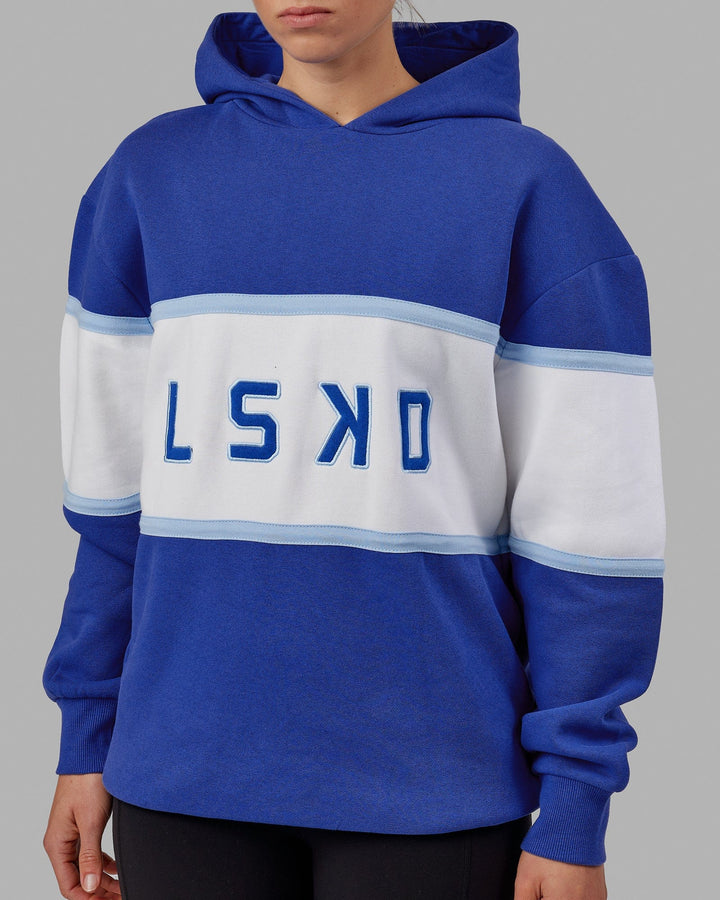Woman wearing Unisex Aligned Hoodie Oversize - Power Cobalt
