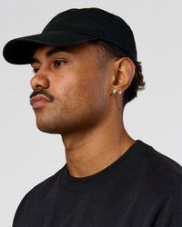 Man wearing All Day Cap in Black