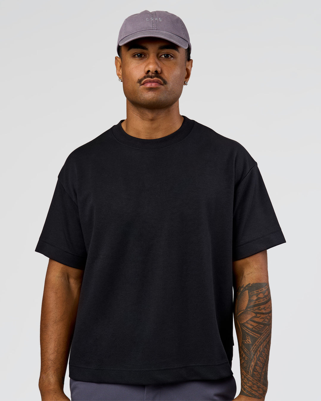 Man wearing All Day Cap in Duskstone