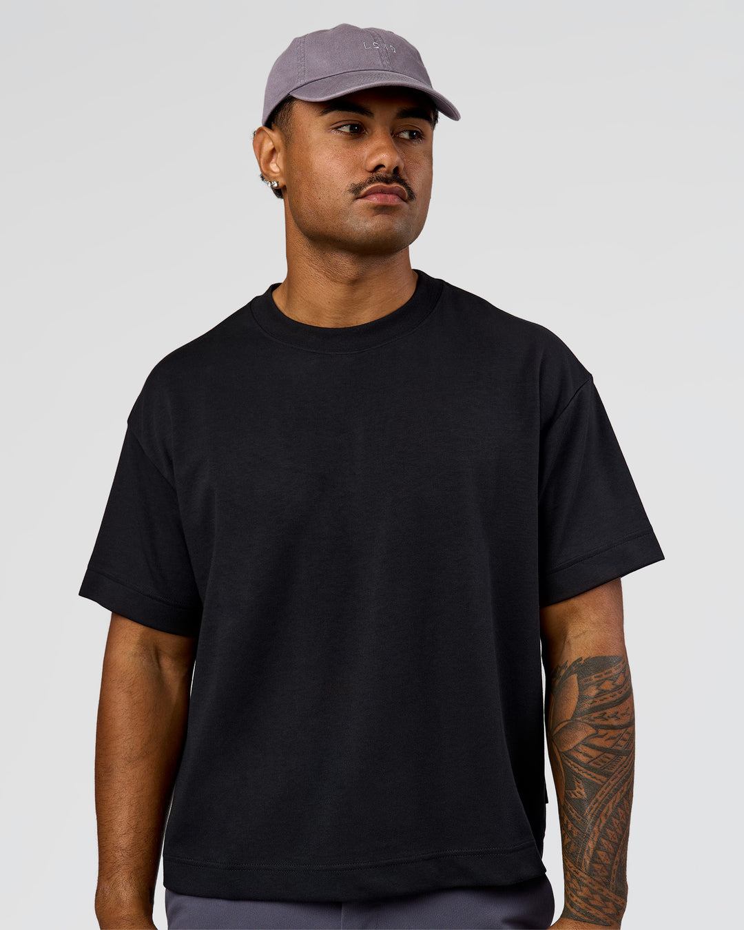 Man wearing All Day Cap in Duskstone