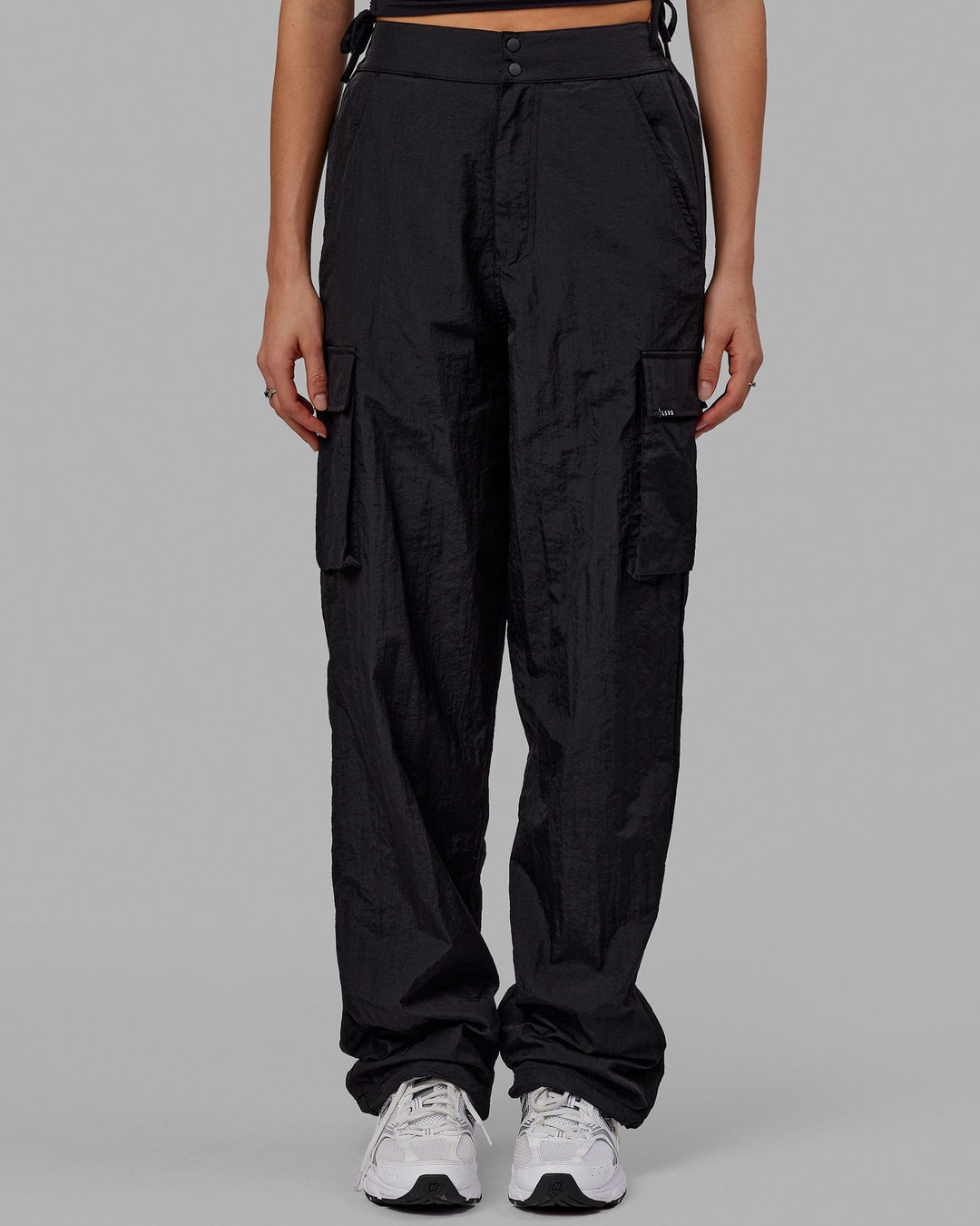 Woman wearing Unisex All Day Performance Cargo Pant - Black