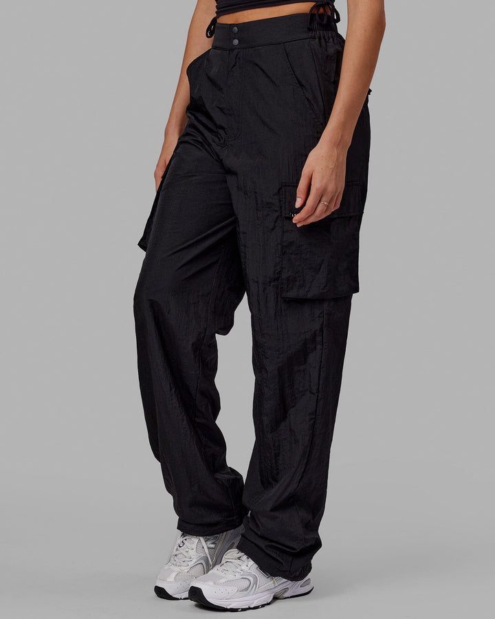 Woman wearing Unisex All Day Performance Cargo Pant - Black