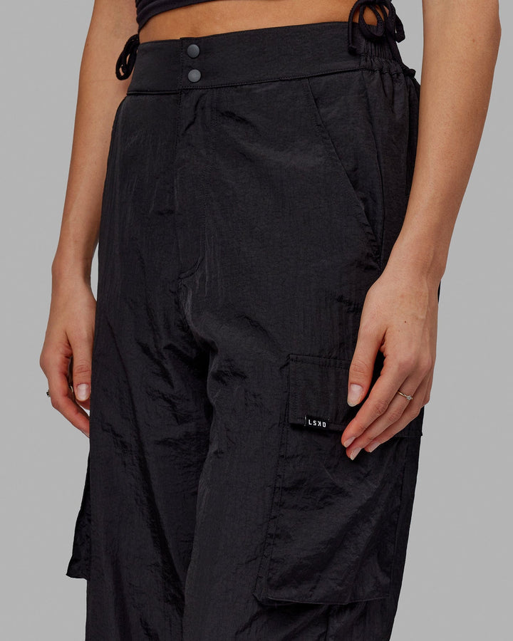 Woman wearing Unisex All Day Performance Cargo Pant - Black