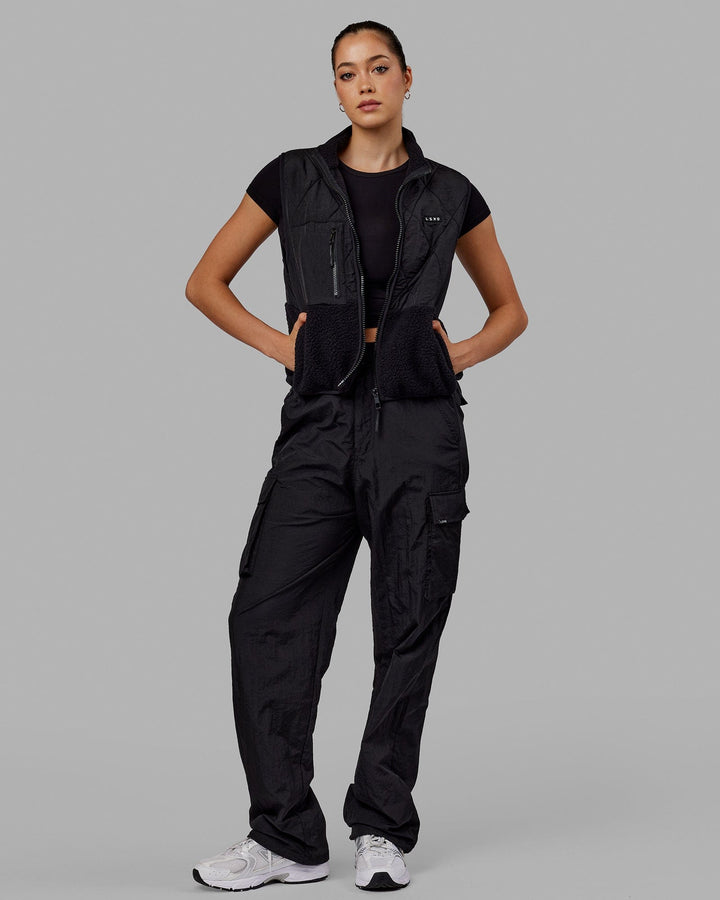 Woman wearing Unisex All Day Performance Cargo Pant - Black