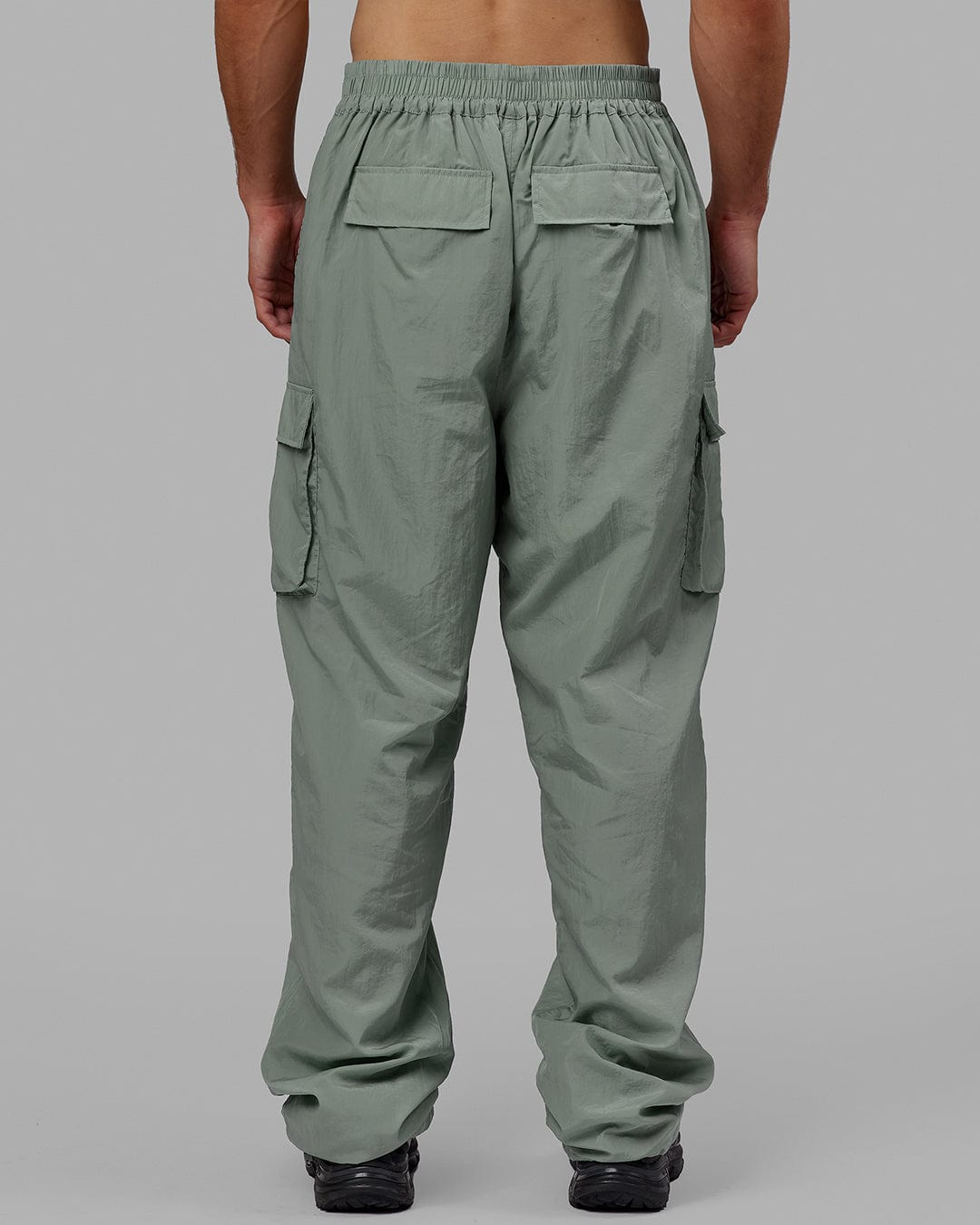 Man wearing Unisex All Day Performance Cargo Pant - Iceberg Green