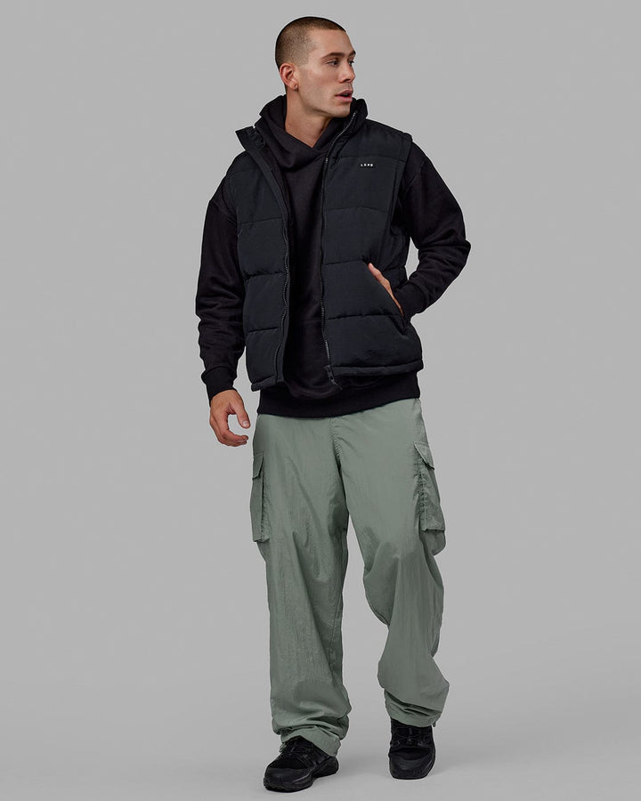 Man wearing Unisex All Day Performance Cargo Pant - Iceberg Green