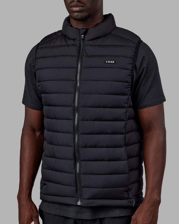 Man wearing All Day Puffer Vest - Black