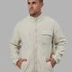 Man wearing Alpine Jacket - Bone