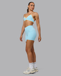 Woman wearing Ambience Sports Bra - Crystal Blue-Lemon
