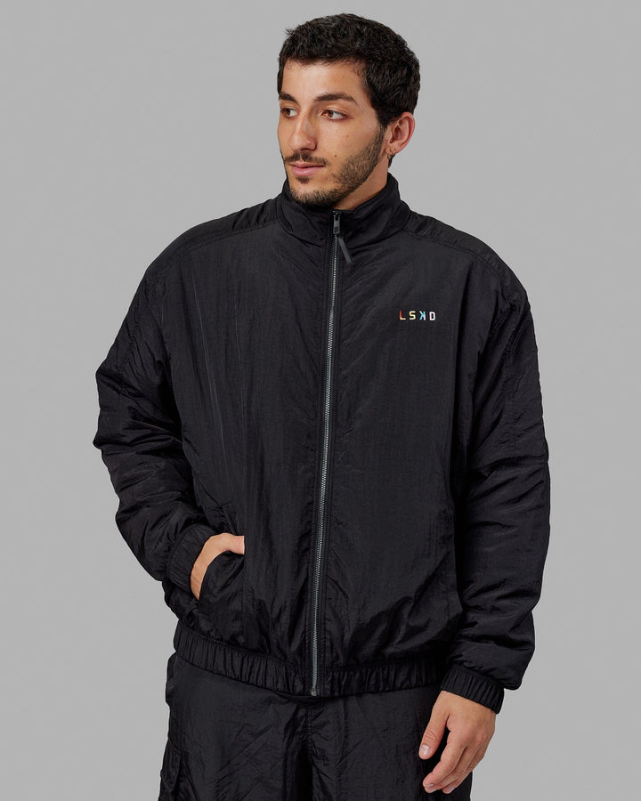 Man wearing Unisex Amplify Bomber Jacket - Black
