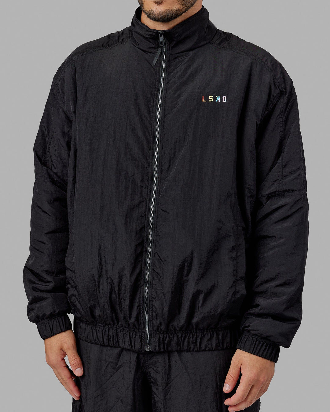 Man wearing Unisex Amplify Bomber Jacket - Black