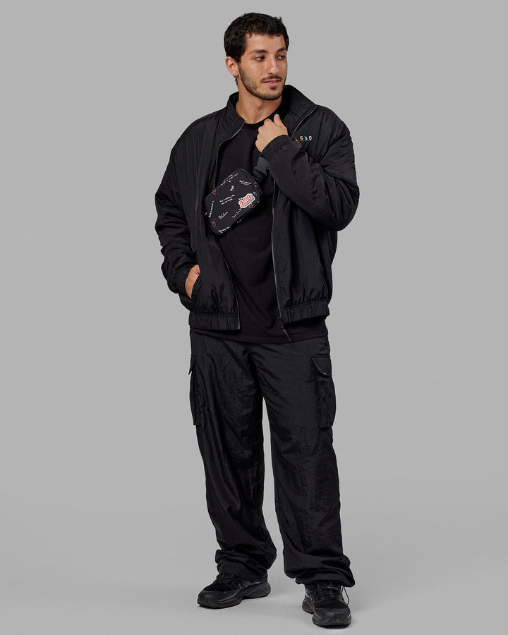 Man wearing Unisex Amplify Bomber Jacket - Black