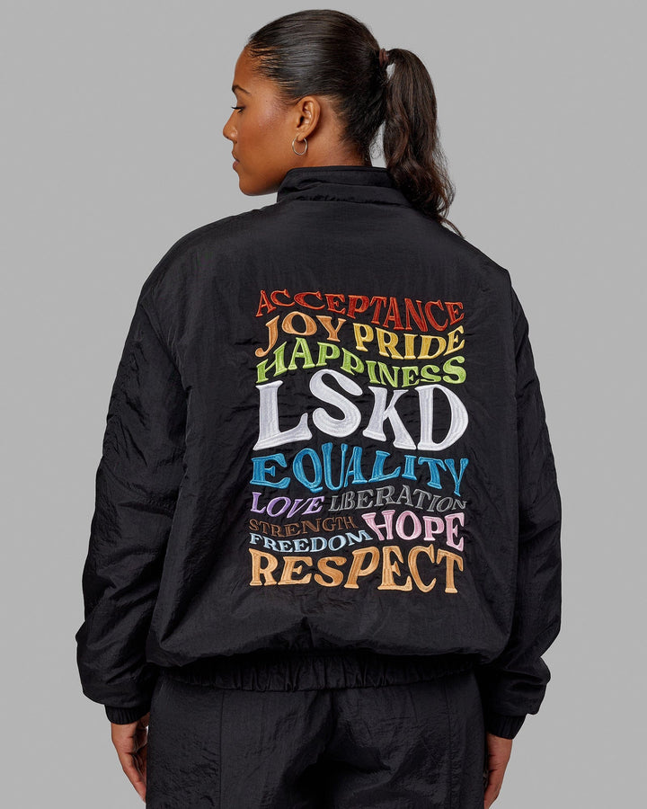 Woman wearing Unisex Amplify Bomber Jacket - Black