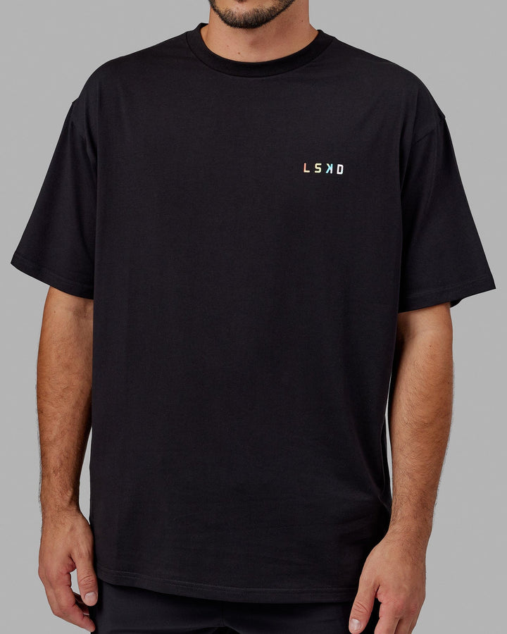 Man wearing Unisex Amplify FLXCotton Tee Oversize - Black