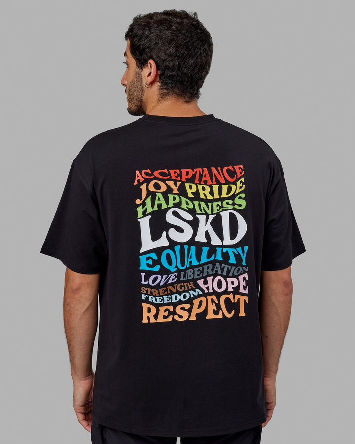 Man wearing Unisex Amplify FLXCotton Tee Oversize - Black
